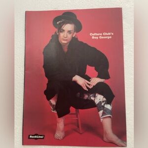 Boy George Pinup on Red Background